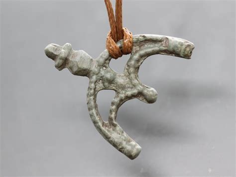 Channeling your inner strength with the bow and arrow amulet